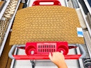 embossed doormat sitting on a target cart