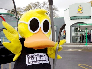 Quick Quack Car Wash mascot with vacuum