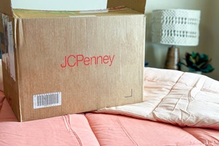 jcpenney box on bed 