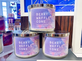 Three Berry Waffle Cone scented candles stacked on display at Bath & Body Works.