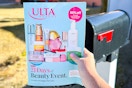 someone holding the Ulta 21 days of beauty mailer next to their mailbox