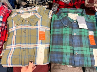 two men's flannel shirts next to each other