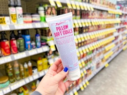 hand holding miss jessie's pillow soft curls in walgreens