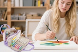 a woman near a pencil case bag