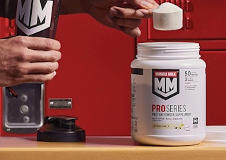 protein powder being scooped out on a table