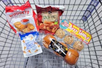 chicken nuggets, onion rings, caramel apples, waffle cones, and brioche hamburger buns in a cart