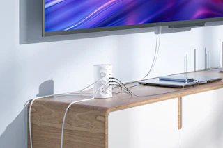 power strip tower plugged into various electronics