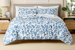 Lifestyle image of the White Floral Mainstays by Becky G. & Alejandra 3-Piece Comforter Set in bedroom setting