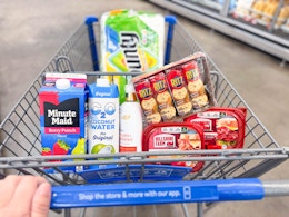 Groceries, Dove Serum Body Wash and Bounty Paper Towels in Walmart shopping cart
