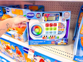 hand holding vtech dj mixer on target shelf