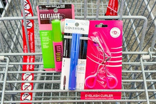 maybelline and covergirl mascaras in a cart with a one+other eyelash curler