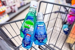 3 bottles of mouthwash in a cart
