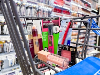 a walmart cart with a maybelline makeup beauty haul in basket 