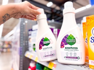 hand holding seventh generation fabric softener on walmart shelf