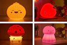 4 lifestyle images of Urban Shop jumbo squishy lights: dumpling, strawberry, mushroom & jellyfish