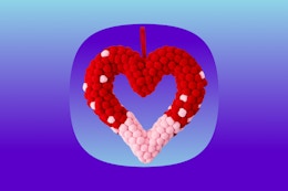 Stock image of a red/pink pom pom Valentine's Day Wreath