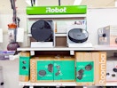 roomba robot vacs sitting on target shelves