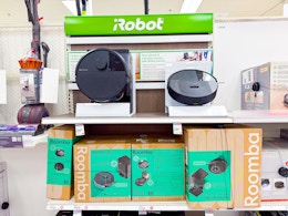 roomba robot vacs sitting on target shelves