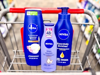 one nivea body wash and two lotions inside shopping cart