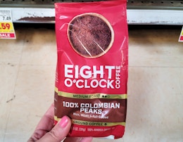 hand holding bag of coffee