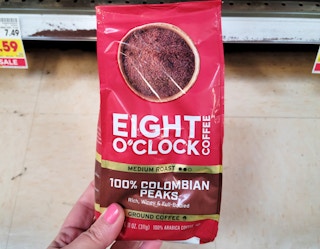 hand holding bag of coffee