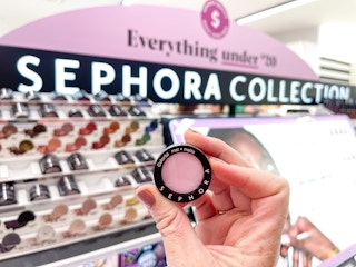 a person holding sephora eyeshadow in store
