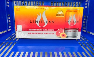 8 pack box of limitless sparkling water in blue walmart hand basket