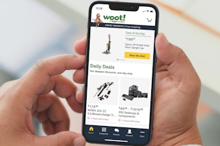 person holding phone showing woot deals