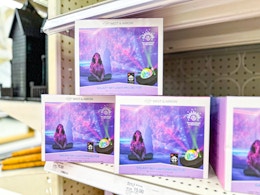 led galaxy projector sitting on a target shelf