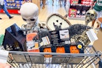 aldi-halloween-deals-091725-skeleton-pumpkin-shaped-candle-metal-haunted-house-ice-molds