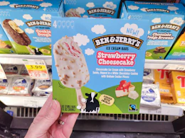 hand holding a box of ben jerry ice cream bars