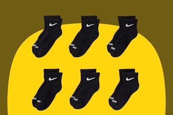 Six pairs of ankle socks for little kids or large-footed toddlers, black with white Nike swish