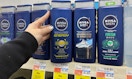 hand holding nivea men's body wash in cvs