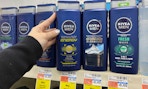 hand holding nivea men's body wash in cvs