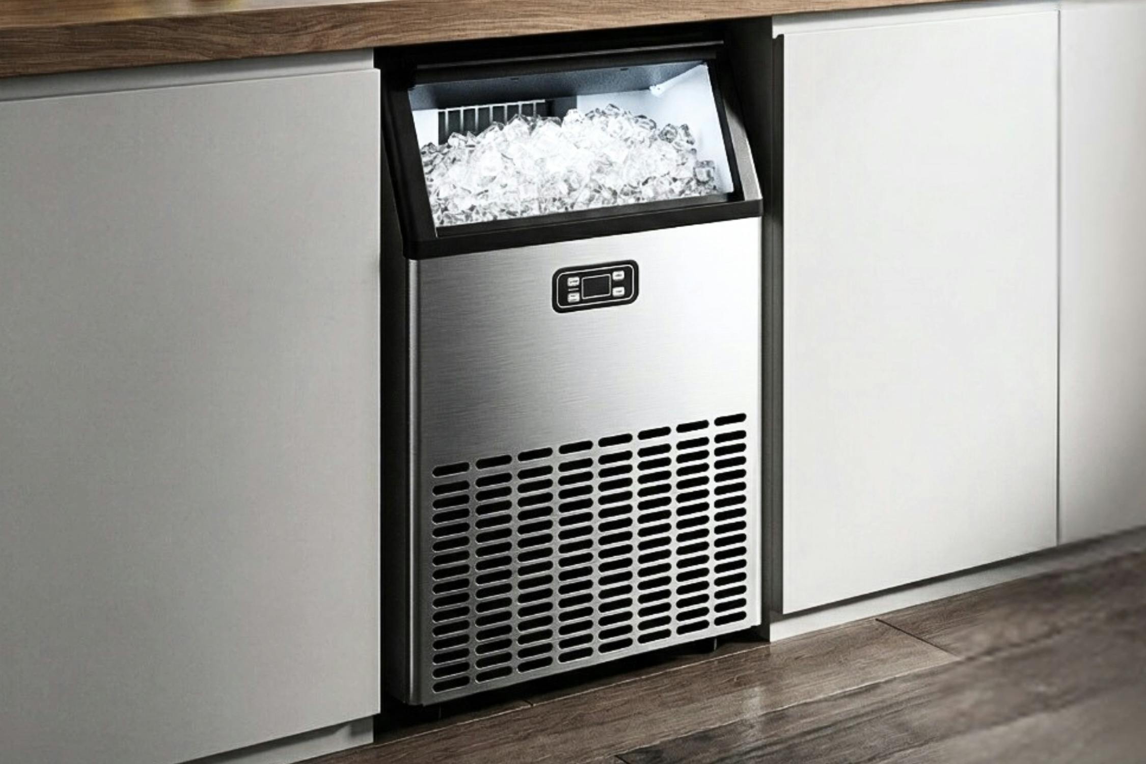 Lifestyle image of the Simzlife Freestanding Ice Machine installed in home kitchen