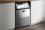 Lifestyle image of the Simzlife Freestanding Ice Machine installed in home kitchen