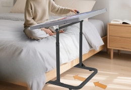 person building a puzzle on a felt puzzle board