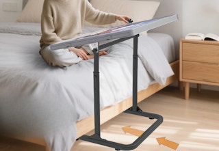 person building a puzzle on a felt puzzle board