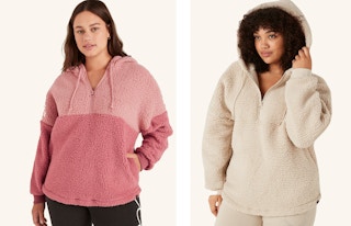 two women wearing a fleece pullover