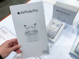 hand holding Apple AirPods Pro in Costco