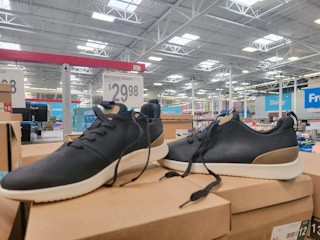 a pair of black steve madden sneakers