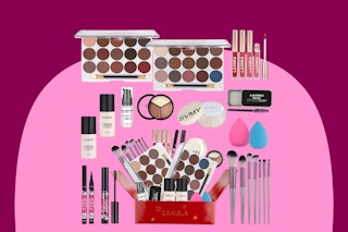 A 23-piece makeup set that includes two eyeshadow palettes, four lip glosses, one mascara, two foundations, and lots more.