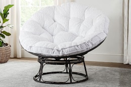 Lifestyle image (home setting) of the Better Homes & Gardens Papasan Chair in white sherpa