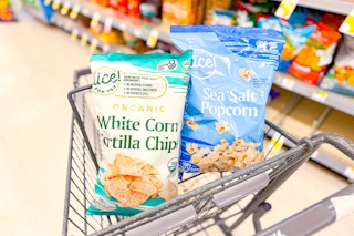 nice tortilla chips and popcorn in a walgreens cart