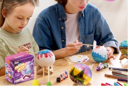 mother and child using moon night light together