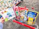 toys in a cart including lego duplo, barbie, national geographic, bounce-off and more