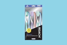 reach toothbrushes on a blue background