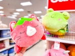 hand holding squishmallows jumbo plush at target