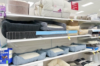 a shelf with dog and pet beds at target