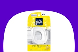 dollar general glade small room air freshener on purple and white background